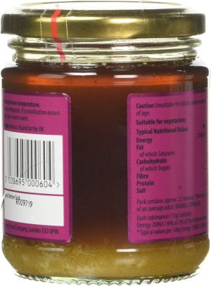 Jar of honey with nutritional information and barcode on purple label packaging, suitable for vegetarians
