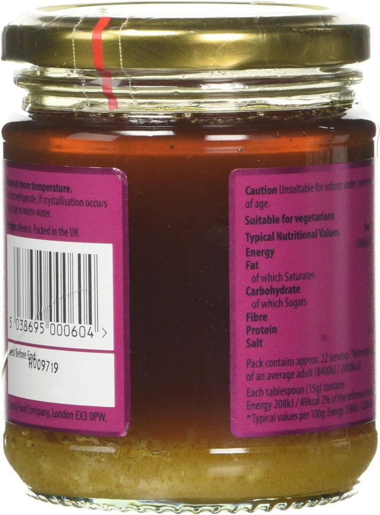 Jar of honey with nutritional information and barcode on purple label packaging, suitable for vegetarians
